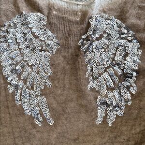Beige Knit Sweater made in Italy with sequin angel wings on it he back medium
